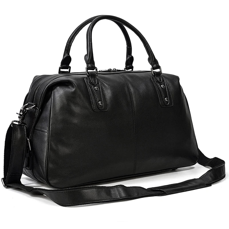 Newsbirds Premium Leder Reisetasche 50 cm - Weiche Cowhide Duffle Bag aus echtem Leder, schwarze Weekend- &amp; Handgepäcktasche für Damen und Herren 