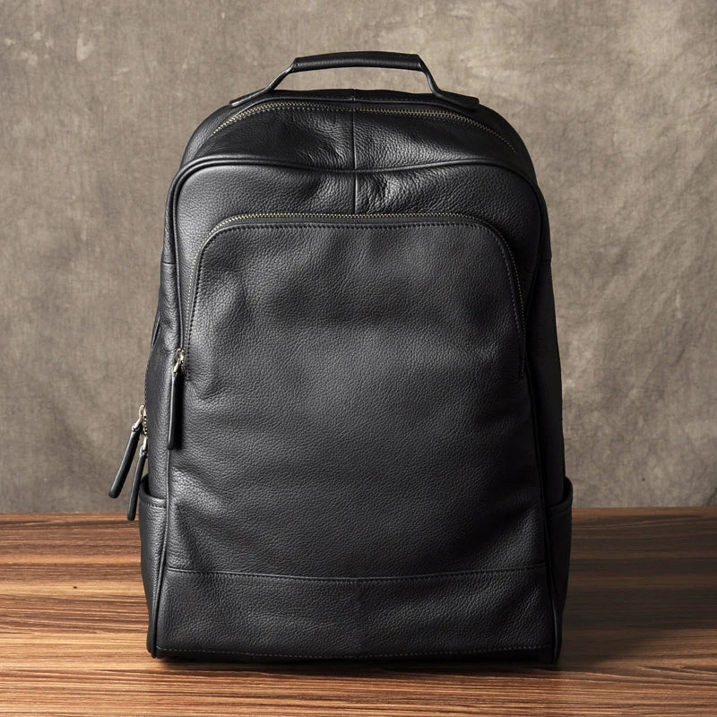 FANCODI Herren Leder Rucksack Schwarz – Hochwertiger Business & Schulrucksack aus Echtleder mit großem Stauraum