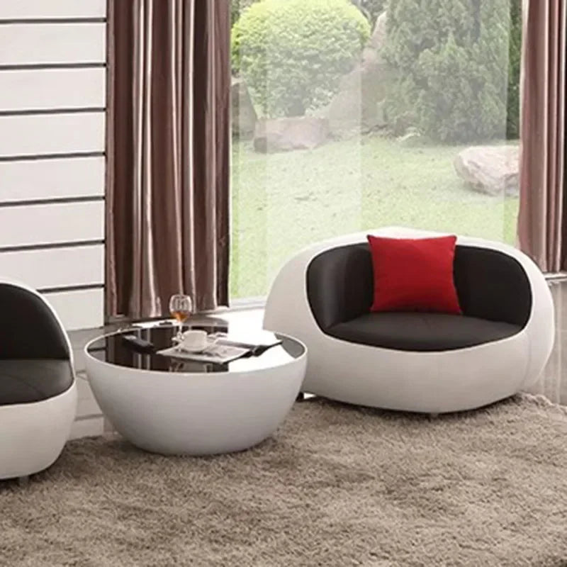 Nordisches Designer Leder-Sofa mit Schlaffunktion – Luxus Lounge Sofa im modernen Stil, geschwungene Relax-Couch aus Rindsleder für Wohnzimmer