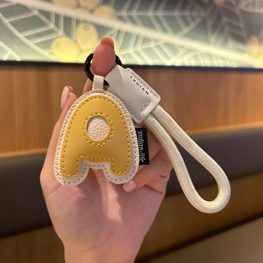 Bunter PU-Leder Schlüsselanhänger mit geflochtener Handschlaufe – Anti-Verlust Keychain & Lanyard für Schlüssel, Tasche, Koffer & Handy