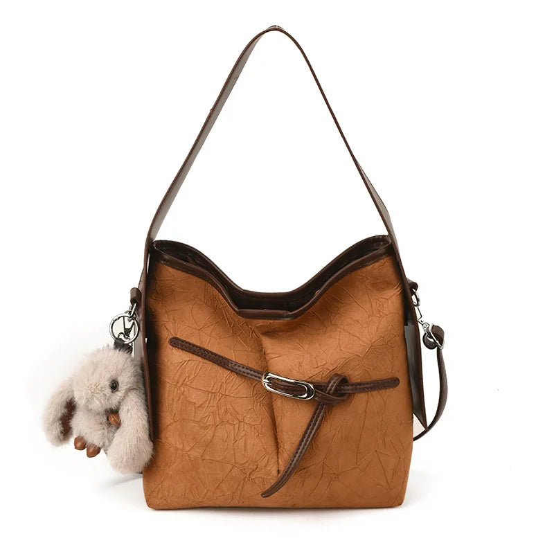 Dames Schultertasche – Sac seau rétro en cuir PU avec autocollants, grande capacité et grand confort