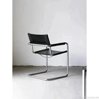 Bauhaus Esszimmerstuhl aus Edelstahl &amp; Sattelleder – Platzsparender Designerstuhl mit Armlehnen für Wohnzimmer &amp; Essbereich