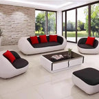 Nordisches Designer Leder-Sofa mit Schlaffunktion – Luxus Lounge Sofa im modernen Stil, geschwungene Relax-Couch aus Rindsleder für Wohnzimmer