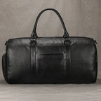 Newsbirds Premium Leder Reisetasche 50 cm - Weiche Cowhide Duffle Bag aus echtem Leder, schwarze Weekend- &amp; Handgepäcktasche für Damen und Herren 