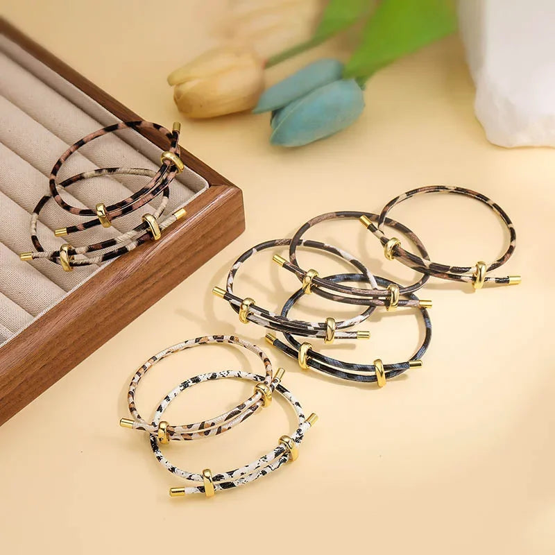 Trendiges PU Leder Wickelarmband mit Animal-Print – Verstellbares Unisex Armband im Kuh-, Schlangen- oder Leopardenmuster, modernes Partnerarmband