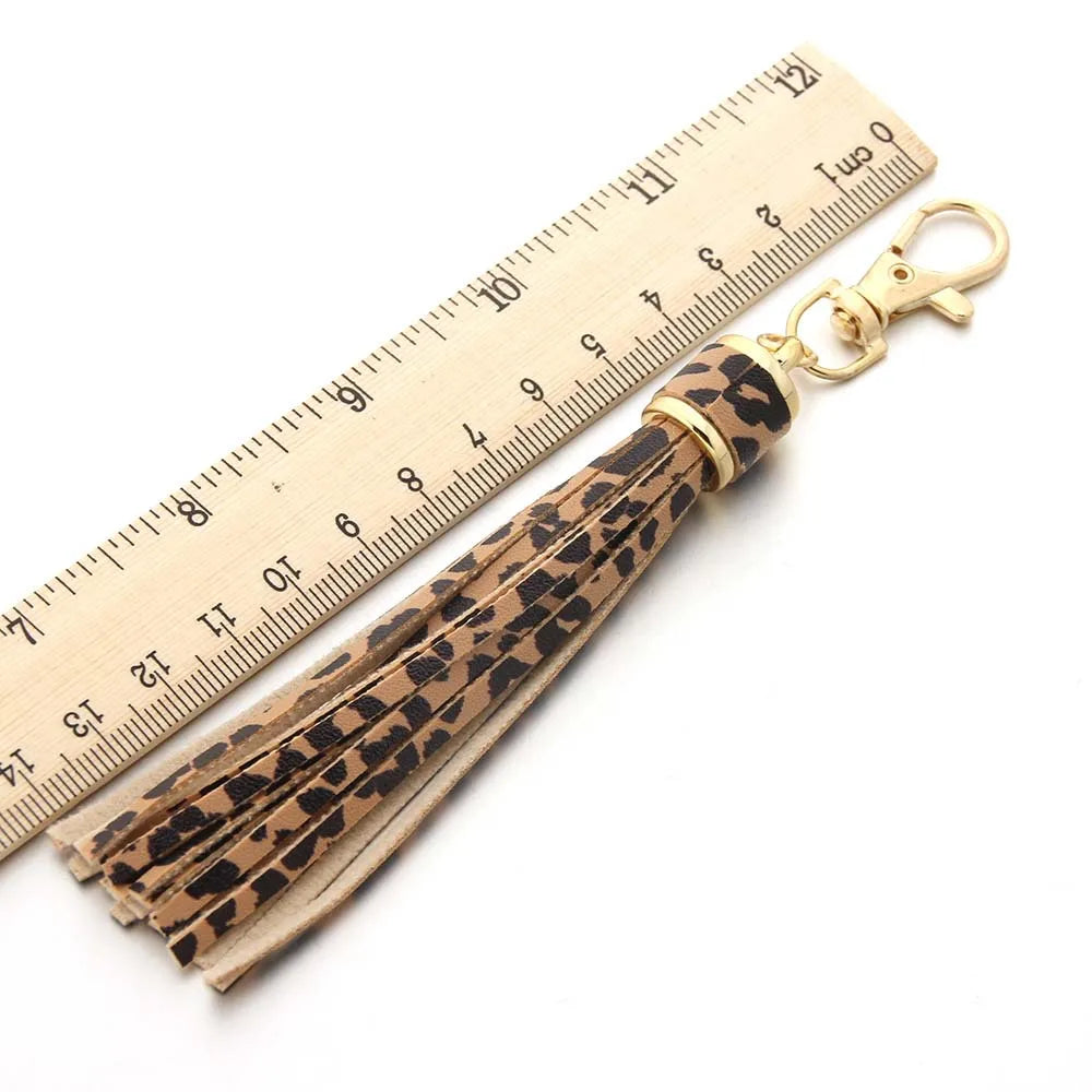 Edler Leder Quasten Schlüsselanhänger mit Karabinerhaken – Eleganter Tassel Keychain & Taschenanhänger in Goldoptik für Damen