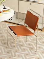 Minimalistischer Leder-Esszimmerstuhl im Vintage-Stil – Eleganter Designerstuhl mit Edelstahlrohr-Gestell für modernes Wohnen