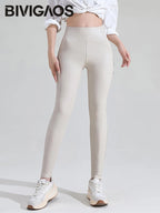 BIVIGAOS Legging en cuir pour femme avec lettres graffitis - Legging chaud en polaire taille haute, style gothique automobile pour l'hiver et l'hiver 