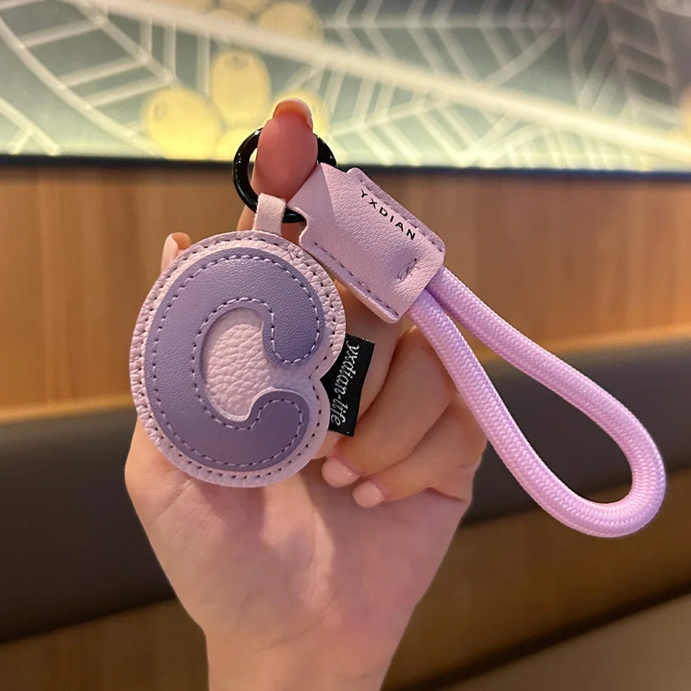 Bunter PU-Leder Schlüsselanhänger mit geflochtener Handschlaufe – Anti-Verlust Keychain & Lanyard für Schlüssel, Tasche, Koffer & Handy