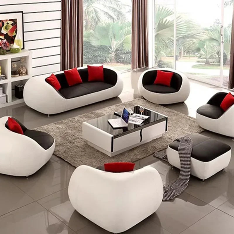 Nordisches Designer Leder-Sofa mit Schlaffunktion – Luxus Lounge Sofa im modernen Stil, geschwungene Relax-Couch aus Rindsleder für Wohnzimmer