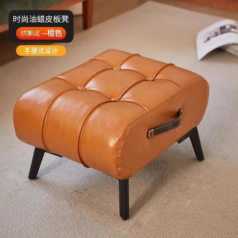 Italienischer Light-Luxury Lederhocker in Oil-Wax-Optik – Tragbarer Schuhwechsel- & Fußhocker mit Griff für Wohnzimmer, Flur & Sofa