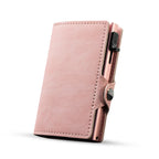 CASEKEY Smart Wallet Pink - Cartera de cuero minimalista y delgada con protección RFID, tarjeta emergente y correa de viaje