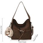 Dames Schultertasche – Sac seau rétro en cuir PU avec autocollants, grande capacité et grand confort