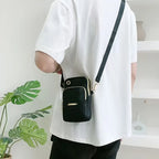 Damen Mini Crossbody Tasche – Vertikale Handy Umhängetasche mit Reißverschluss & Handschlaufe, Praktische Alltagstasche