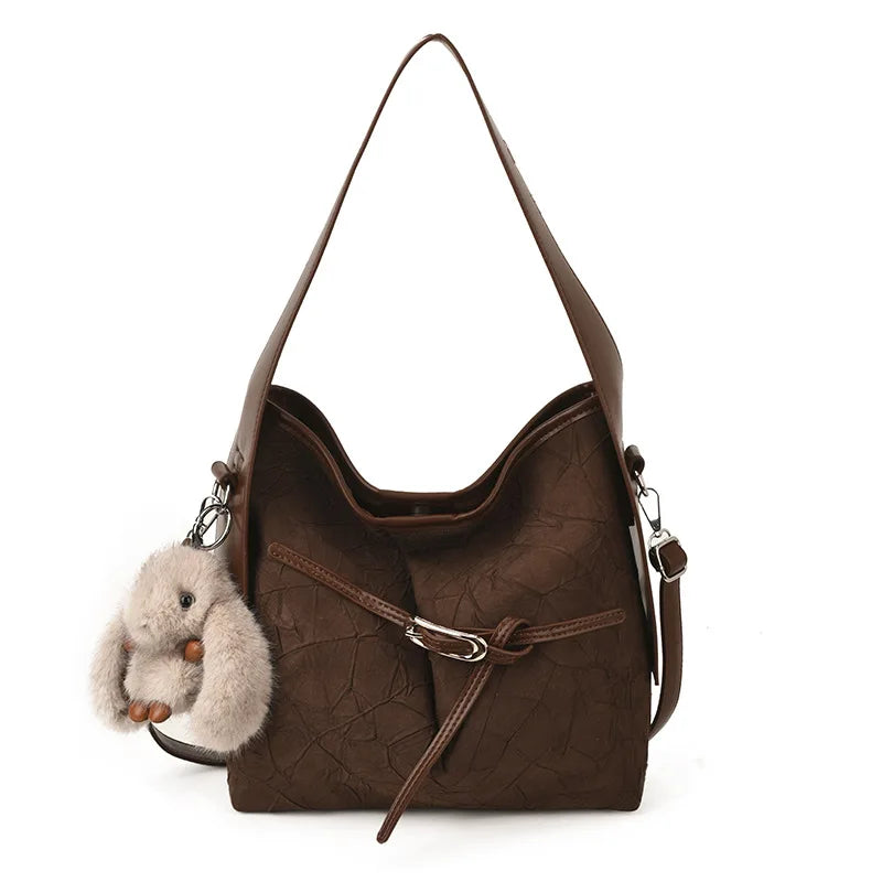 Dames Schultertasche – Sac seau rétro en cuir PU avec autocollants, grande capacité et grand confort