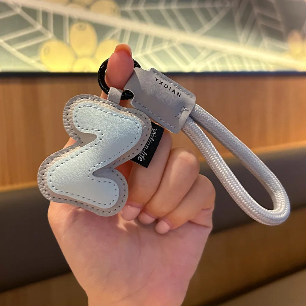 Bunter PU-Leder Schlüsselanhänger mit geflochtener Handschlaufe – Anti-Verlust Keychain & Lanyard für Schlüssel, Tasche, Koffer & Handy