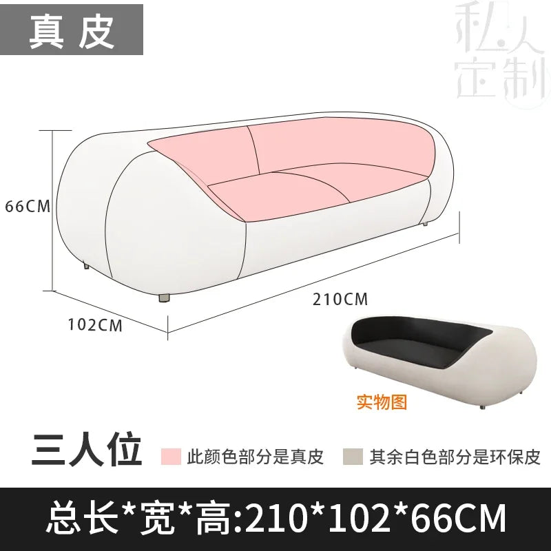 Nordisches Designer Leder-Sofa mit Schlaffunktion – Luxus Lounge Sofa im modernen Stil, geschwungene Relax-Couch aus Rindsleder für Wohnzimmer